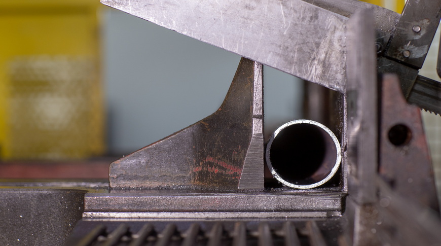 Cutting of tubular and profile materials with band saws